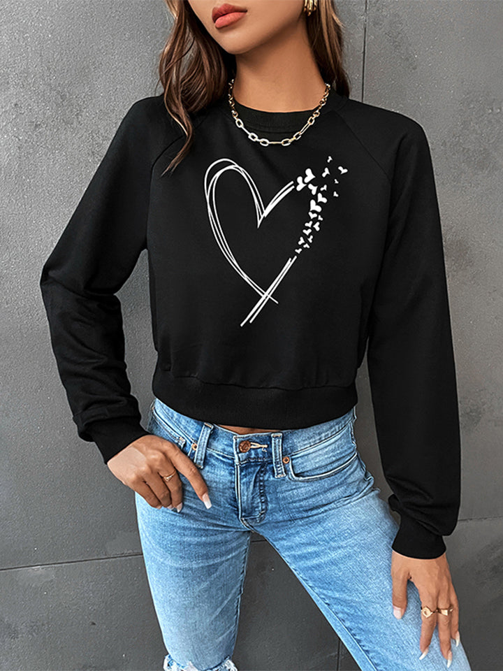 Trendsi Cupid Beauty Supplies Woman Blouse Round Neck Raglan Sleeve Heart Graphic Sweatshirt