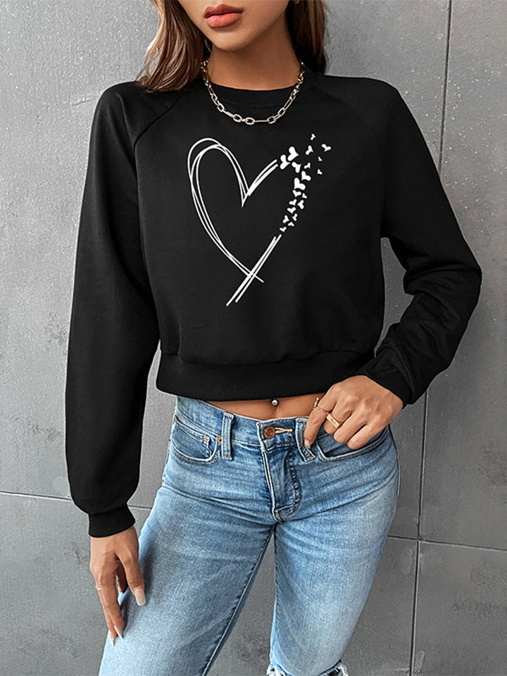 Trendsi Cupid Beauty Supplies Woman Blouse Round Neck Raglan Sleeve Heart Graphic Sweatshirt